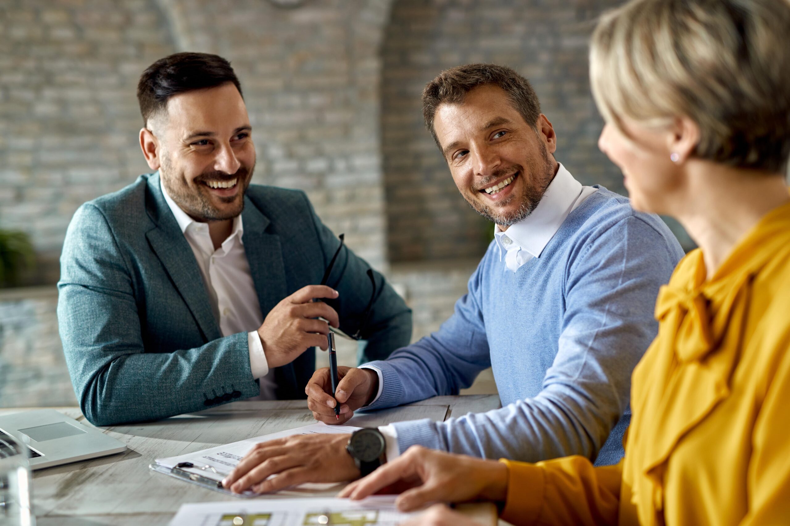 Happy loan officer working with one-stop mortgage services in 2025